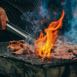 close-up-photo-of-man-cooking-meat-1482803